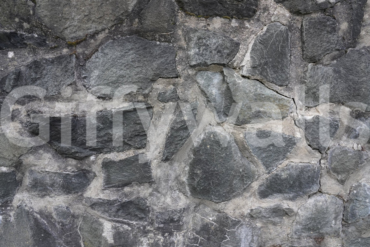 Stone Facade wallpaper mural close-up showing the grey fieldstone rubble masonry pattern detail