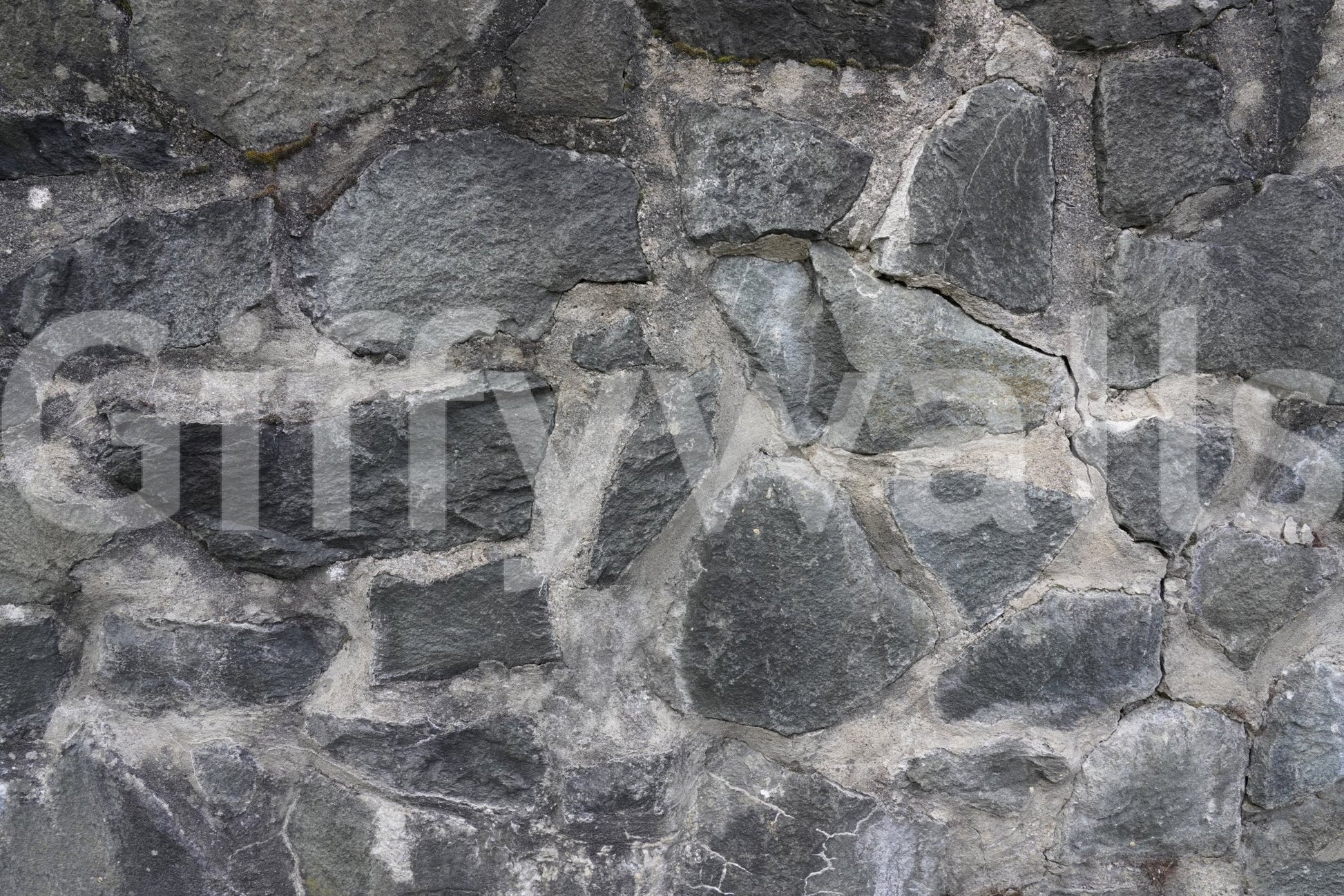 Stone Facade wallpaper mural close-up showing the grey fieldstone rubble masonry pattern detail