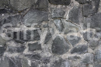 Stone Facade wallpaper mural close-up showing the grey fieldstone rubble masonry pattern detail