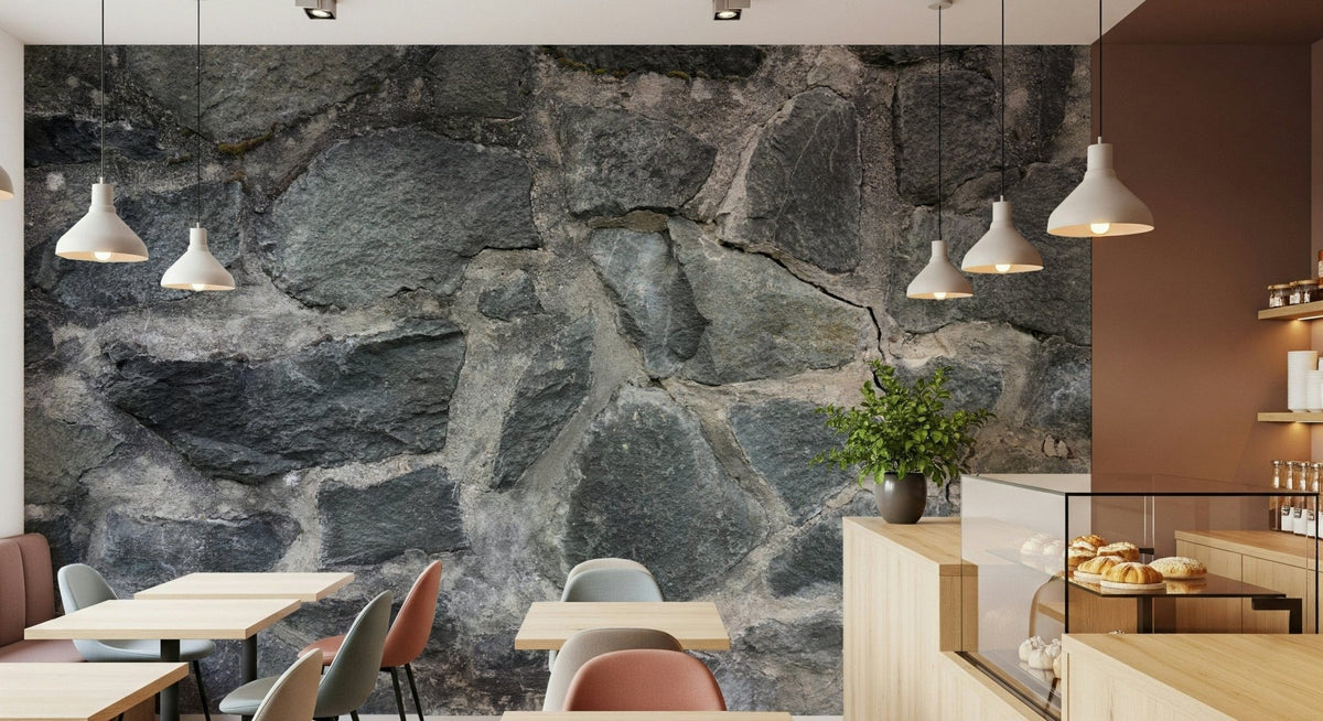 Stone Facade wallpaper mural lining a cafe with wood tables, pastel chairs and a pastry counter