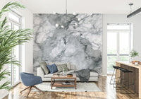 Decorative mural featuring worn stone surfaces in neutral, earthy hues.