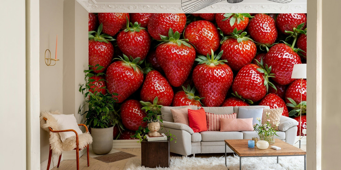 A close-up view of a wallpaper with a strawberry pattern.
