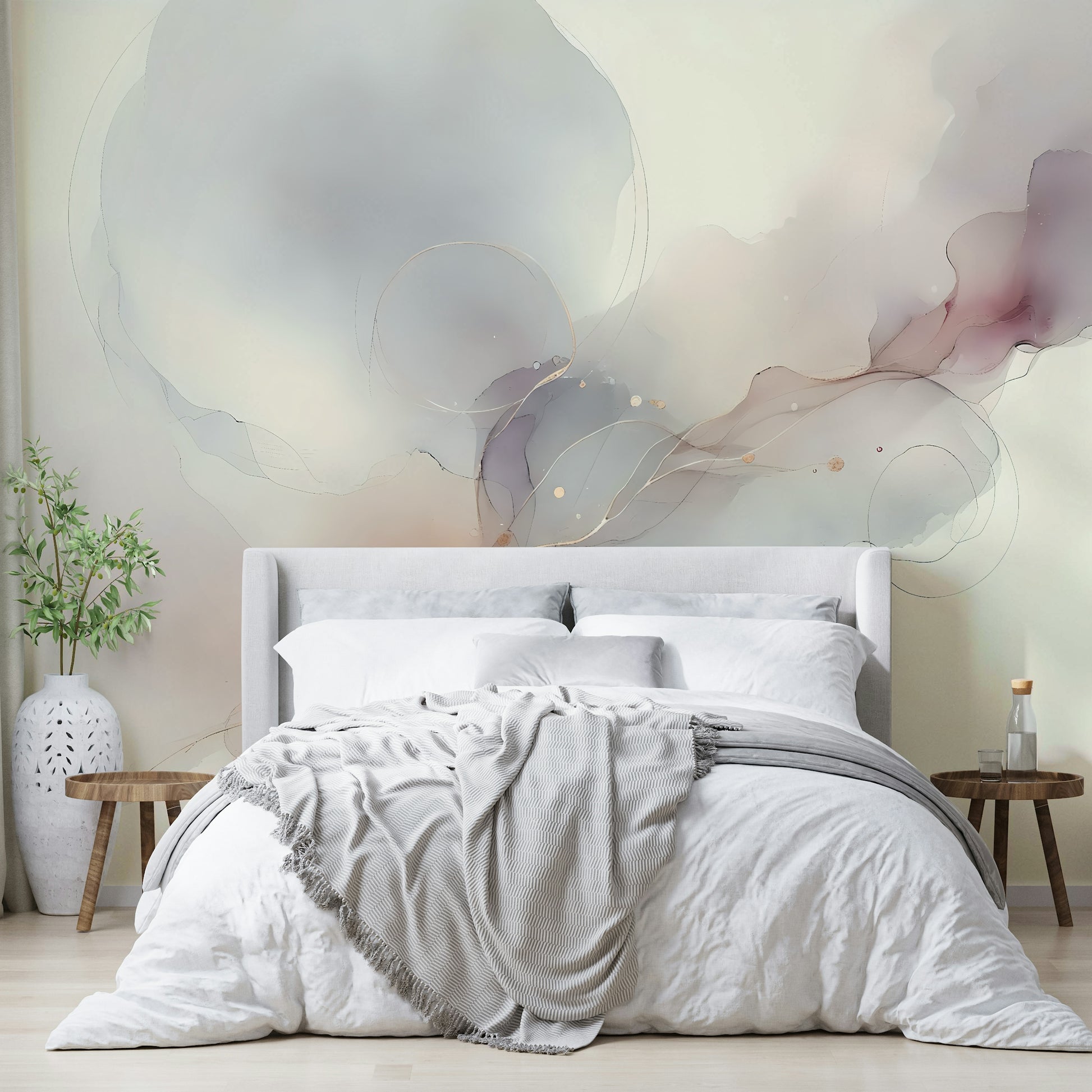 Studio apartment with a serene light-colored landscape mural.
