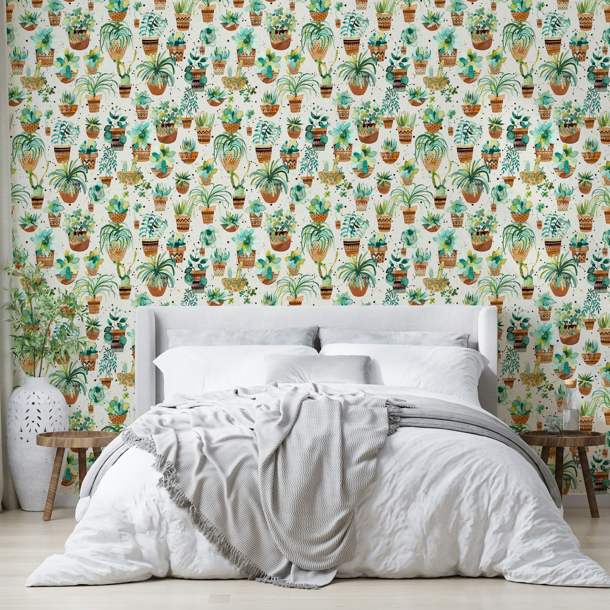 Soft background with succulents and decorative plant pots in a calming design.

