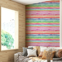 Wallpaper featuring a mix of colorful stripes in lively, energetic hues.

