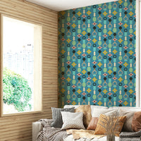 Wallpaper featuring vibrant abstract shapes in retro colors on a blue background.

