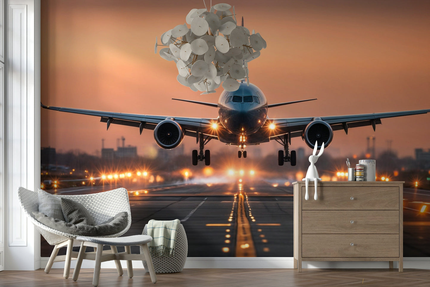 Sunrise landscape wall mural behind modern sofa in living room.