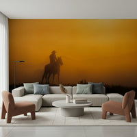 Sunset Ride Wall Mural featuring a scenic sunset with silhouettes of riders.