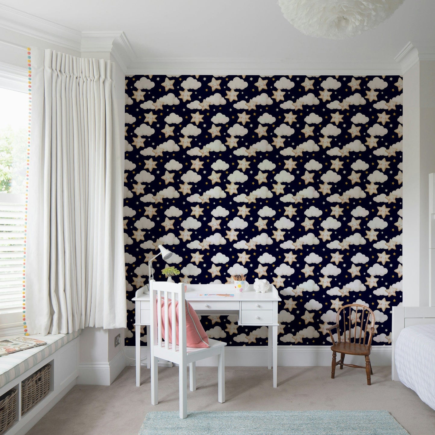 A whimsical wallpaper showing rows of soft clouds and glowing stars in a peaceful night pattern.