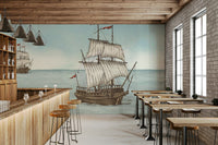 A peaceful wall mural with a natural, nautical design.

