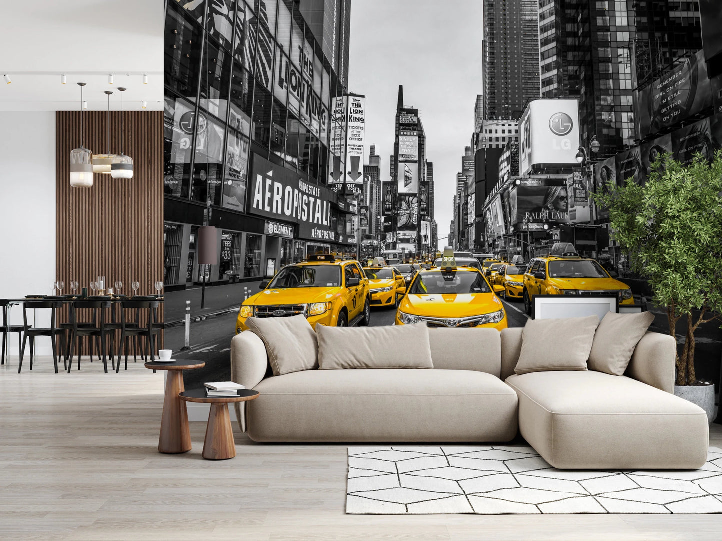 Taxi Rush Hour wallpaper mural of yellow taxis in monochrome New York behind a beige sectional in a living room