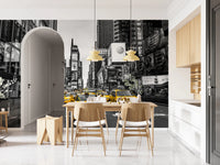 Taxi Rush Hour wallpaper mural of yellow taxis in New York behind a wood dining table and cane chairs