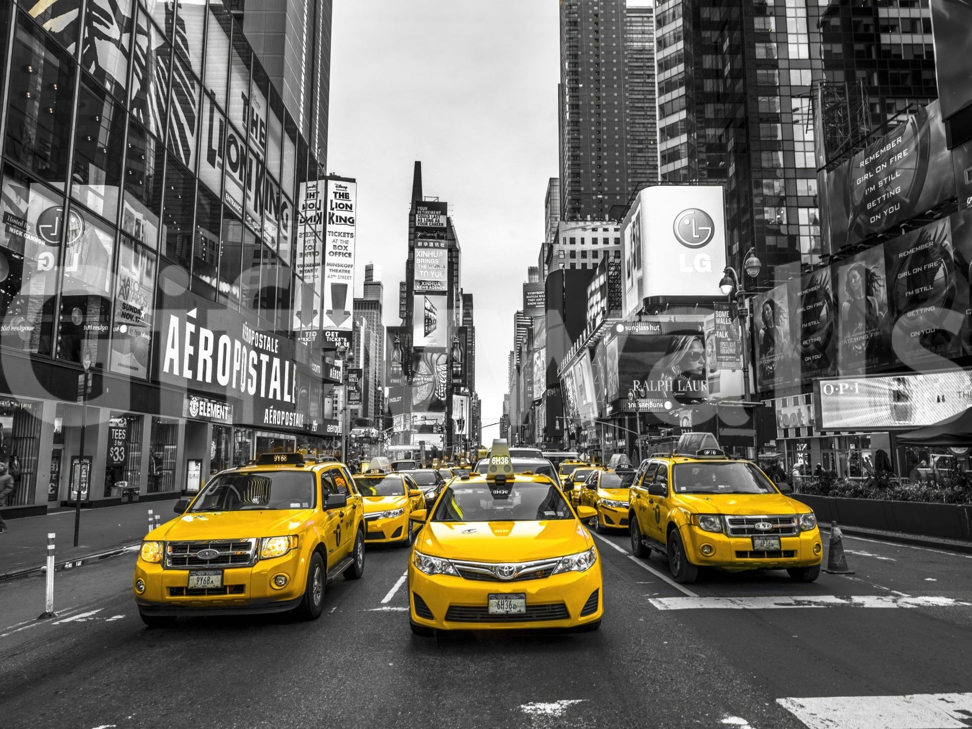 Taxi Rush Hour wallpaper mural shown as a full-wall view of yellow cabs in black-and-white Times Square
