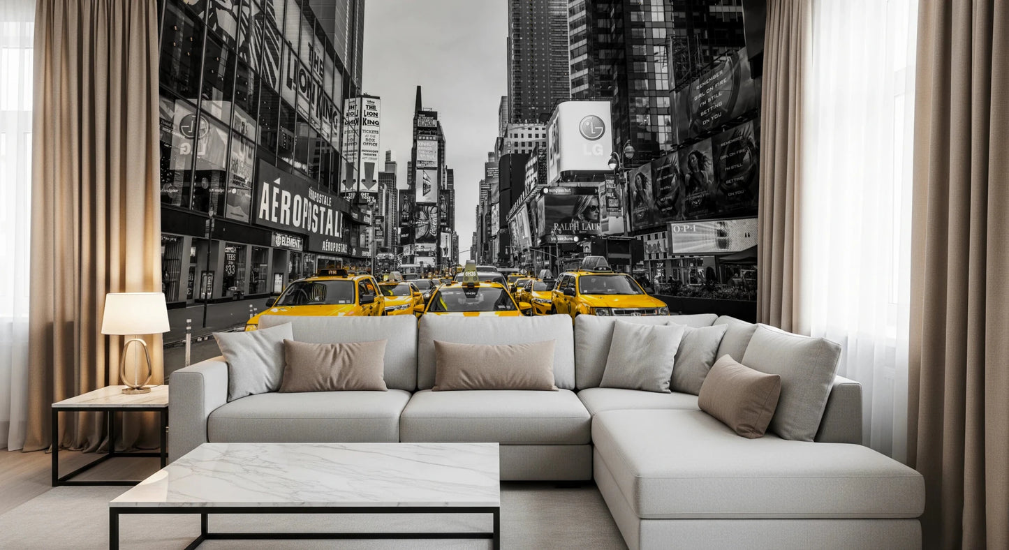 Taxi Rush Hour wallpaper mural of yellow taxis in New York behind a grey L-shaped sectional in a living room