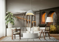 Tay Rail Bridge wallpaper mural in sepia tones behind a white sofa and cane chairs in a living room