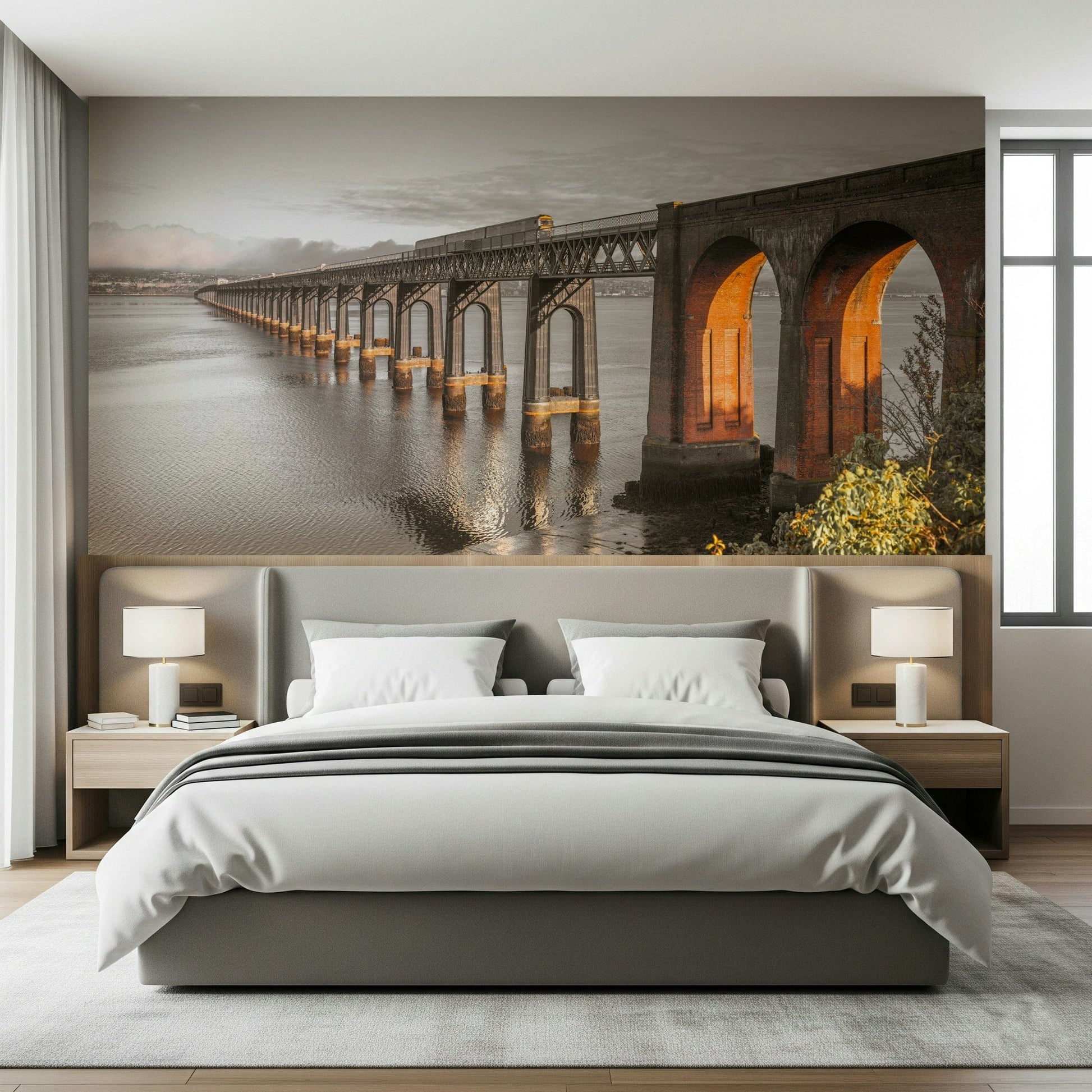 Tay Rail Bridge wallpaper mural with glowing arches above a grey bed with white bedding in a bedroom