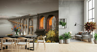 Tay Rail Bridge wallpaper mural behind a black dining table and grey sofa in an open-plan living room