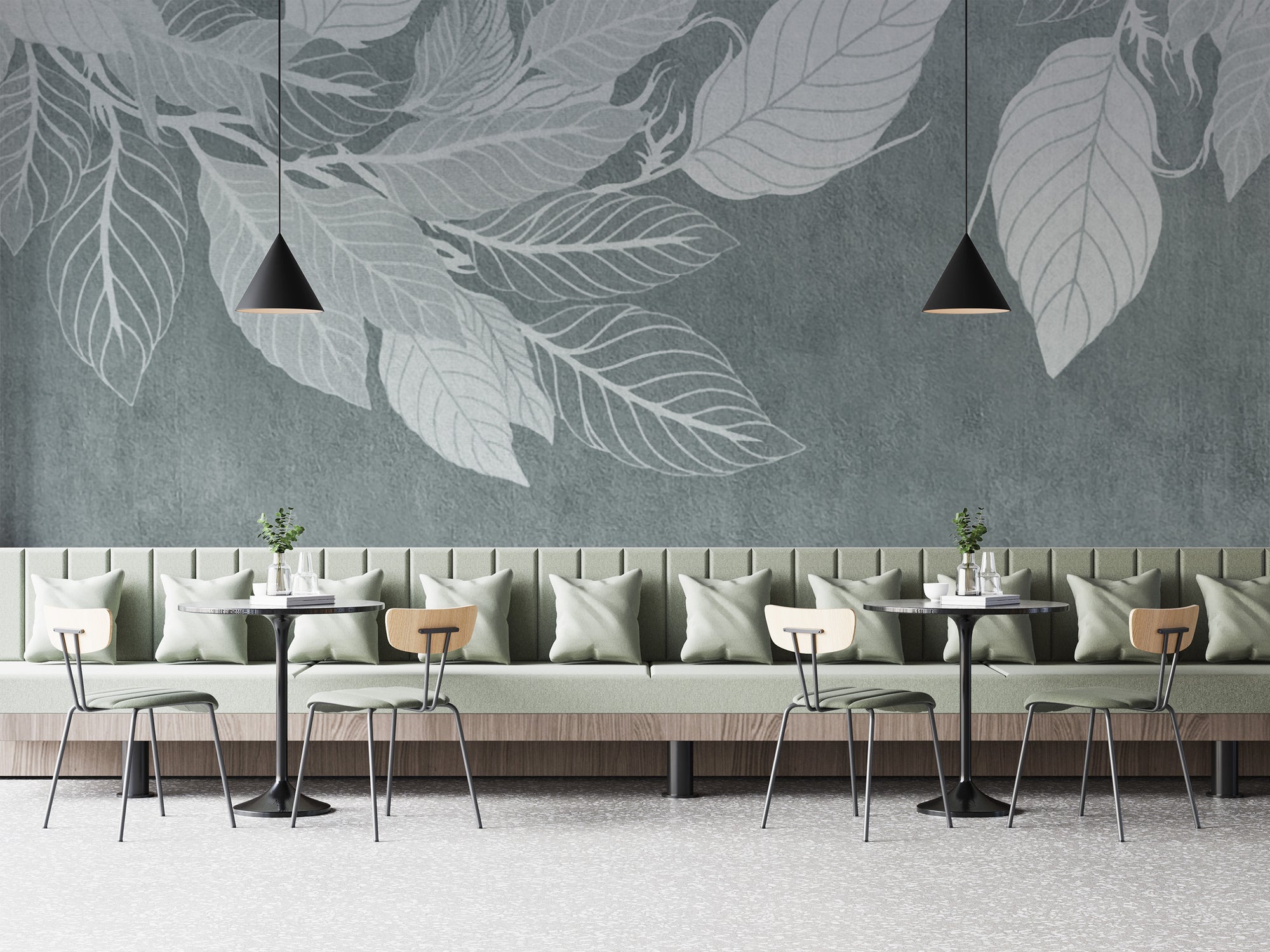 Elegant Teal Botanical Leaf wallpaper mural with pale leaf silhouettes behind a sage banquette and bistro tables in a cafe