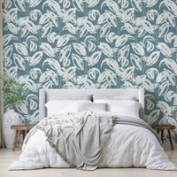 The image features stylized or abstract leaf shapes in various sizes.
