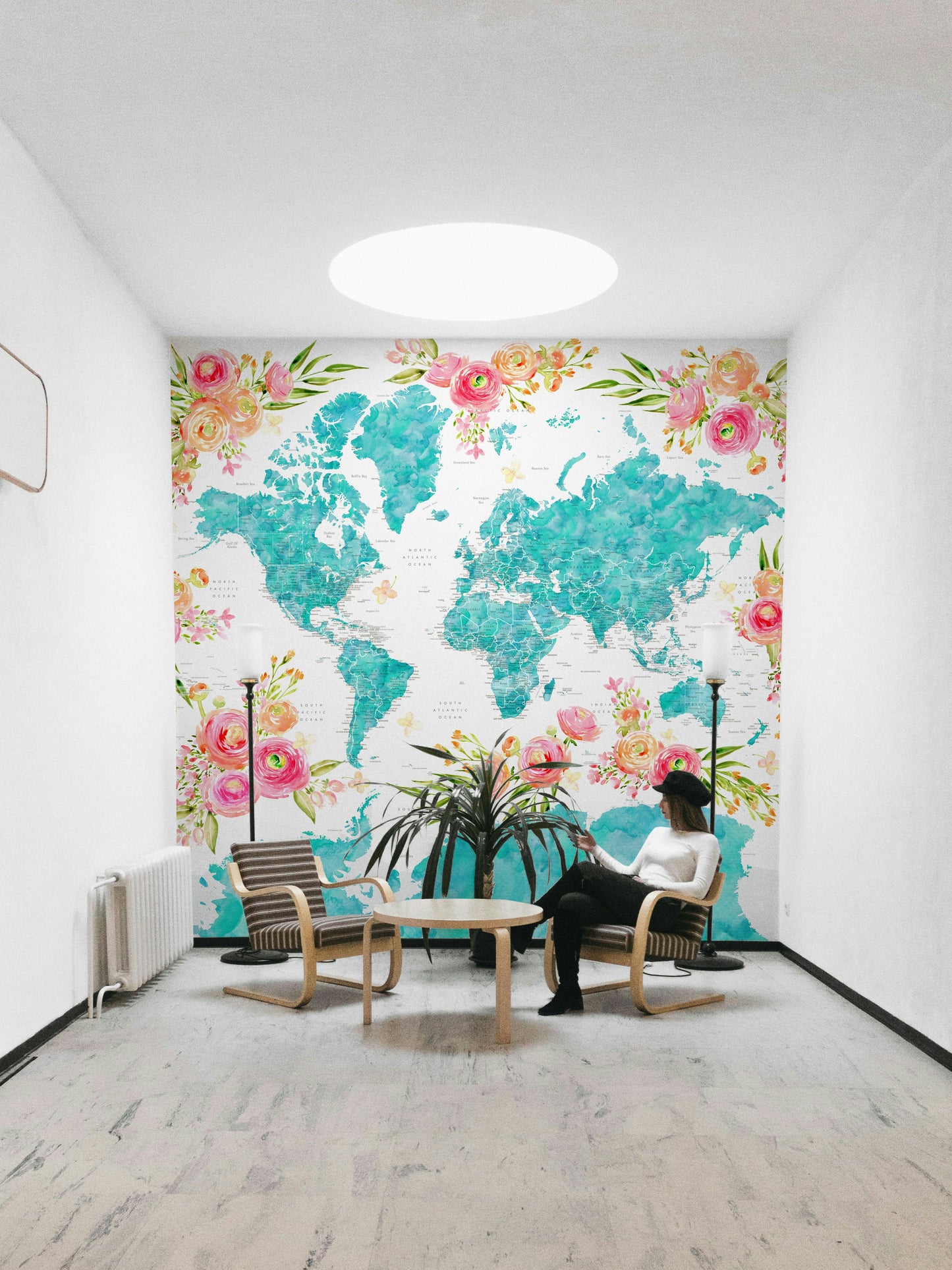 Watercolor-style world map in serene teal hues

