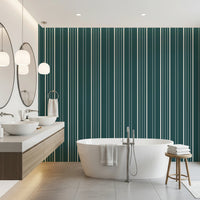 Teal Stripe wallpaper with cream vertical lines behind twin sinks and a freestanding tub in a modern bathroom