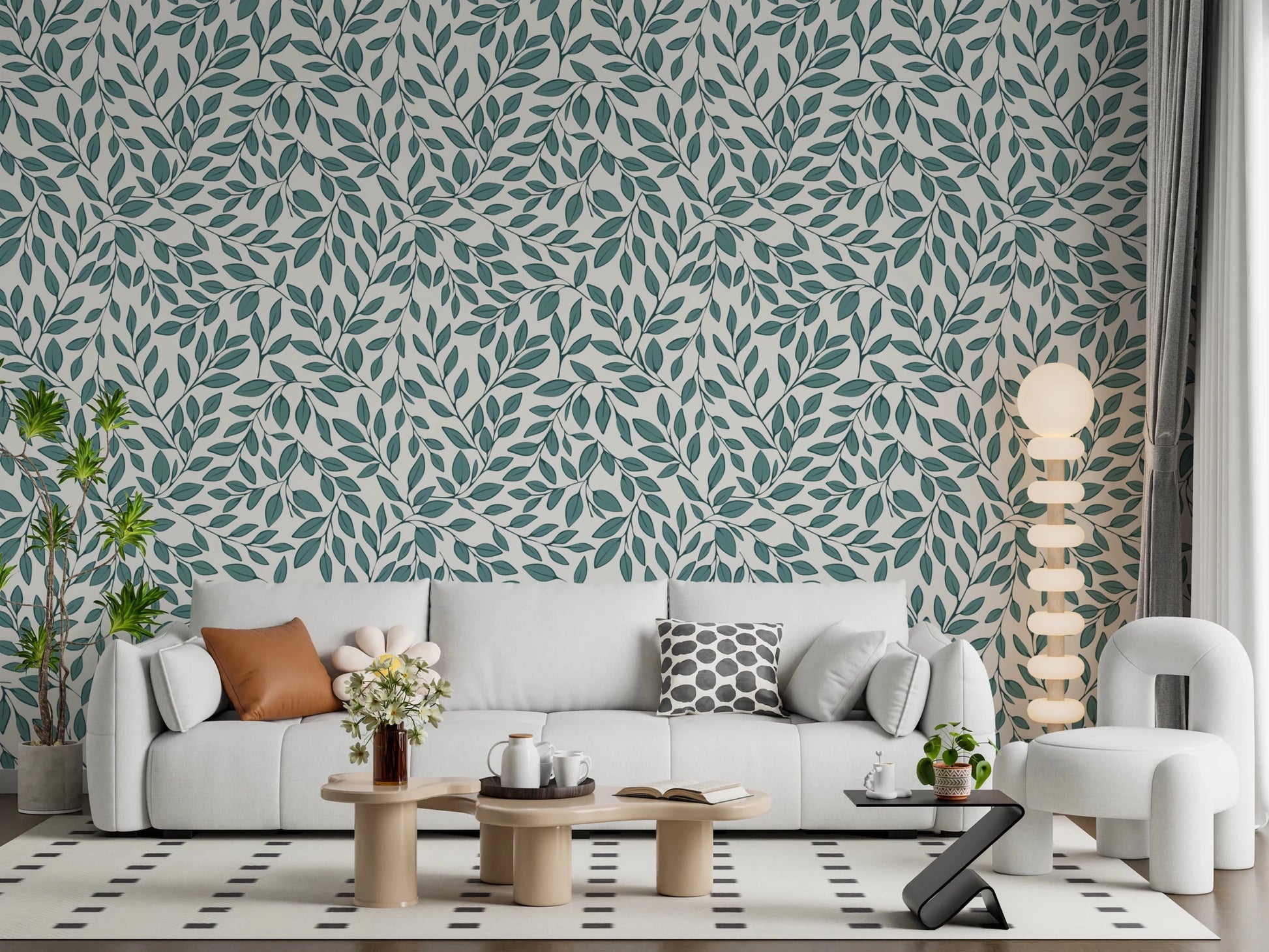 Teal Vines wallpaper of teal leaves on cream behind a white sofa and orb floor lamp in a modern living room