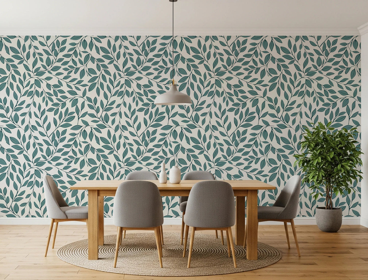 Teal Vines wallpaper with teal foliage behind a wood dining table and grey chairs on a round jute rug