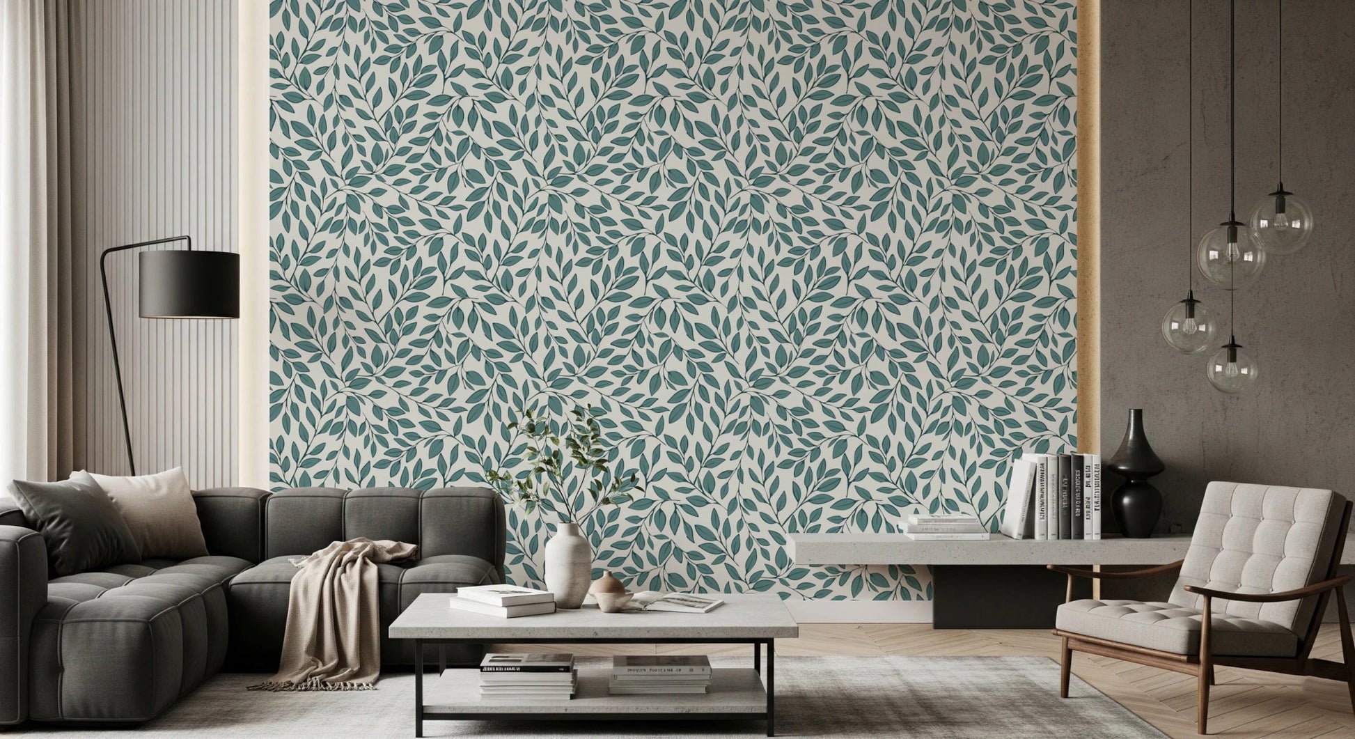Teal Vines wallpaper of teal leaves behind a charcoal sectional sofa with glass globe pendant lights