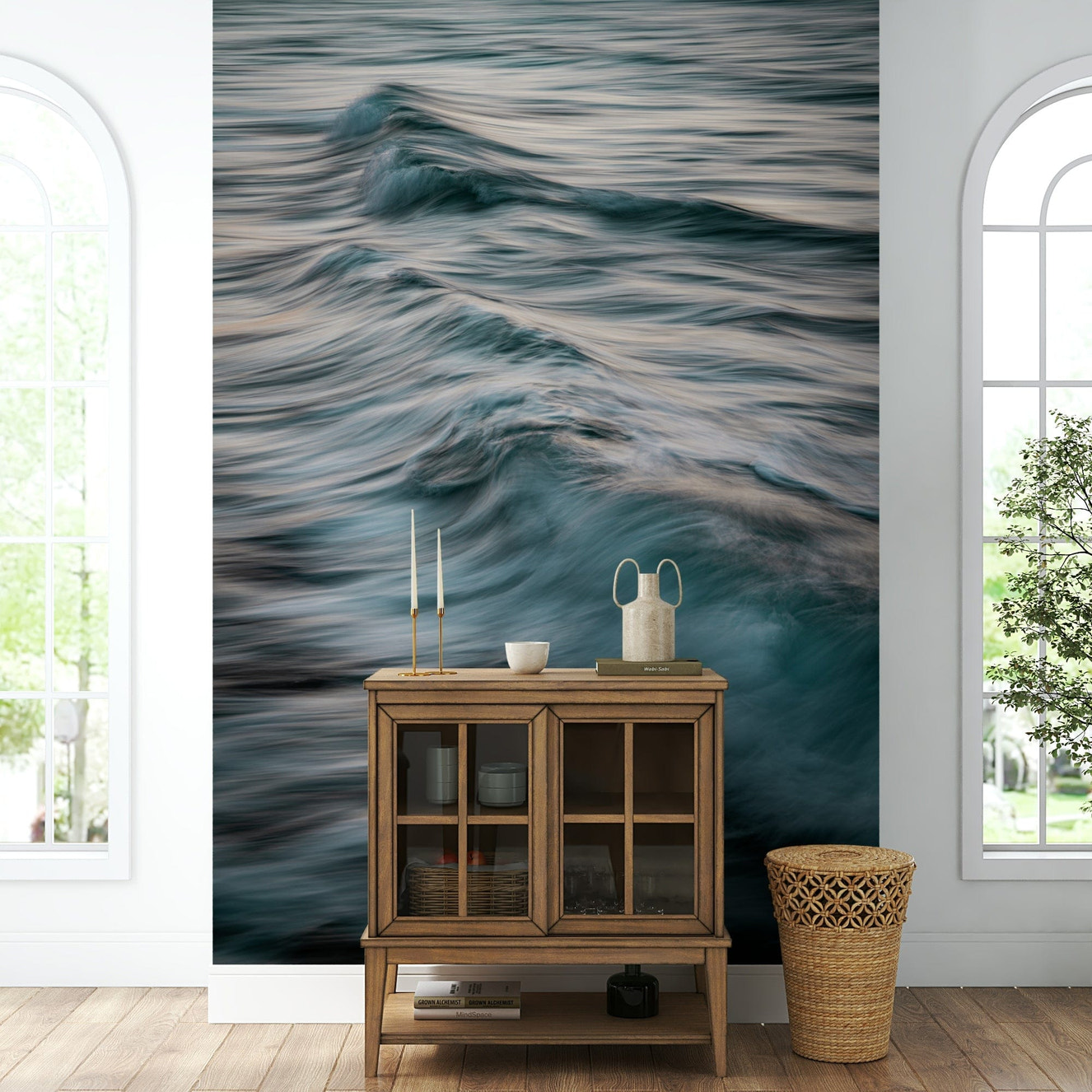 A contemporary living room with a large ocean wave wall mural.

