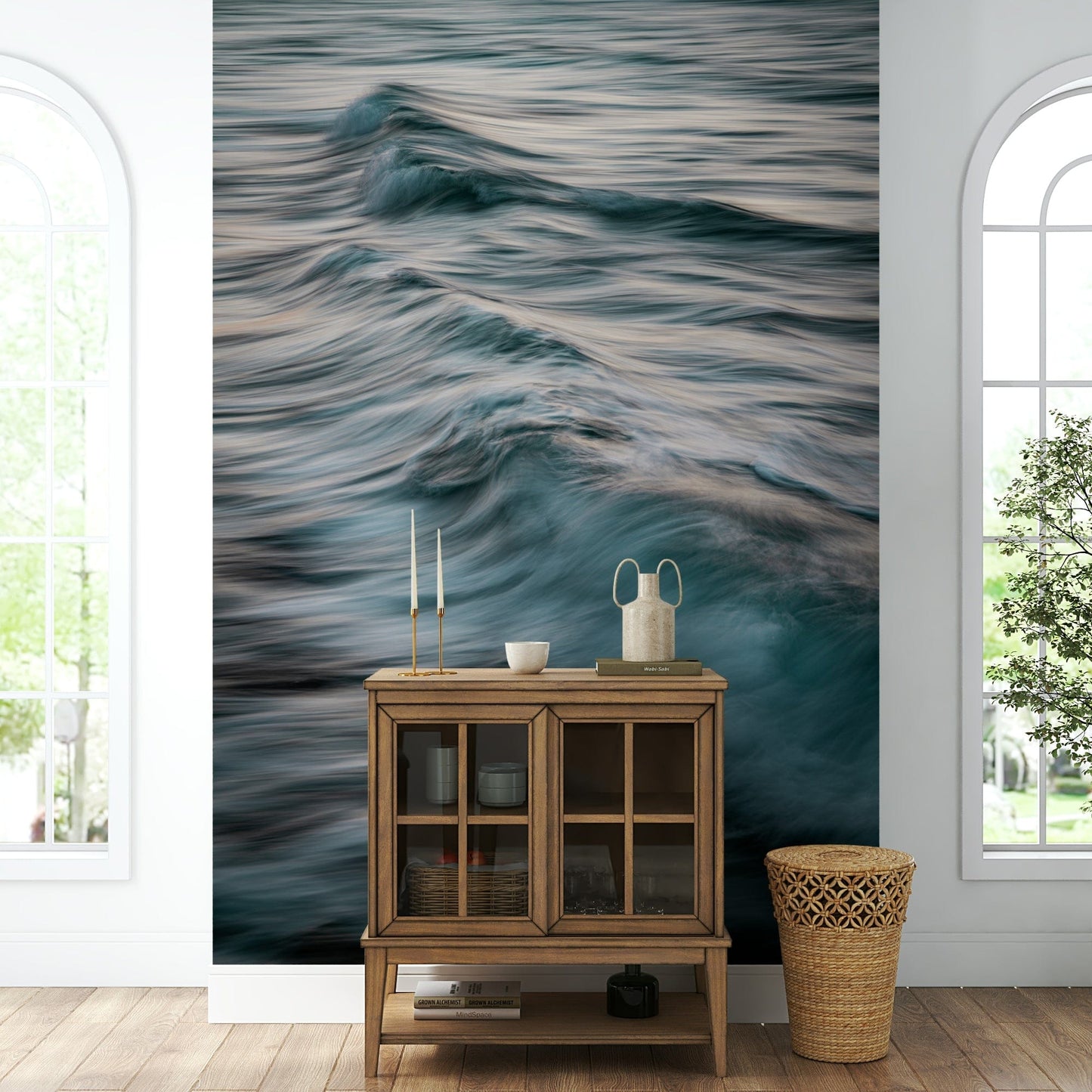A contemporary living room with a large ocean wave wall mural.

