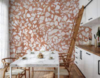 Rich terra-cotta natural wallpaper. Intense marble chip pattern.