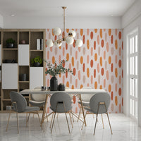 A calming wallpaper with scattered terracotta dashes in earthy orange, peach, and clay tones.