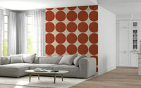 Terracotta bubbles wallpaper featuring large terracotta circles on a warm beige background