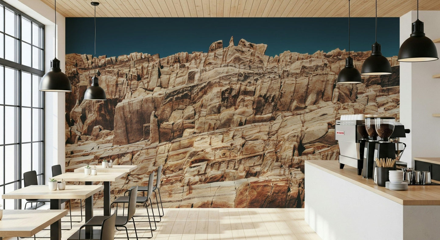 Textured wall mural with layered cliff formations in earthy red and orange hues for rustic and modern spaces.