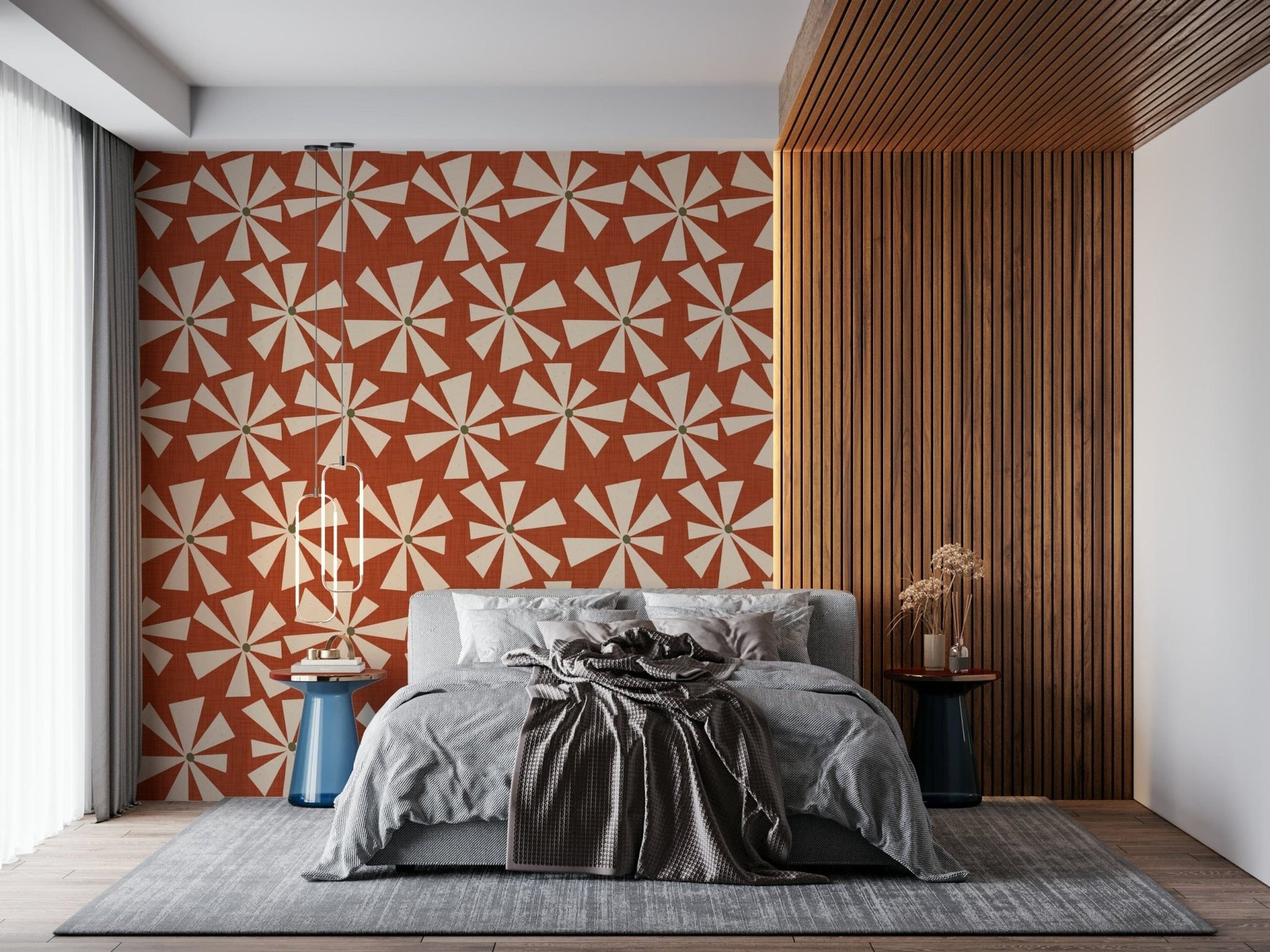 Vintage starburst pattern wallpaper with radiating cream petals on a textured terracotta backdrop.