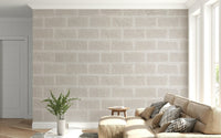Rustic beige brick wallpaper mural with worn finish for a farmhouse or loft-inspired aesthetic.