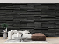 Industrial style wallpaper with deep black textured brick patterns.