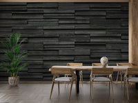 Textured black brick slate wallpaper with a realistic stacked stone effect.