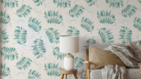 Aqua wallpaper with hand-painted palm leaf design

