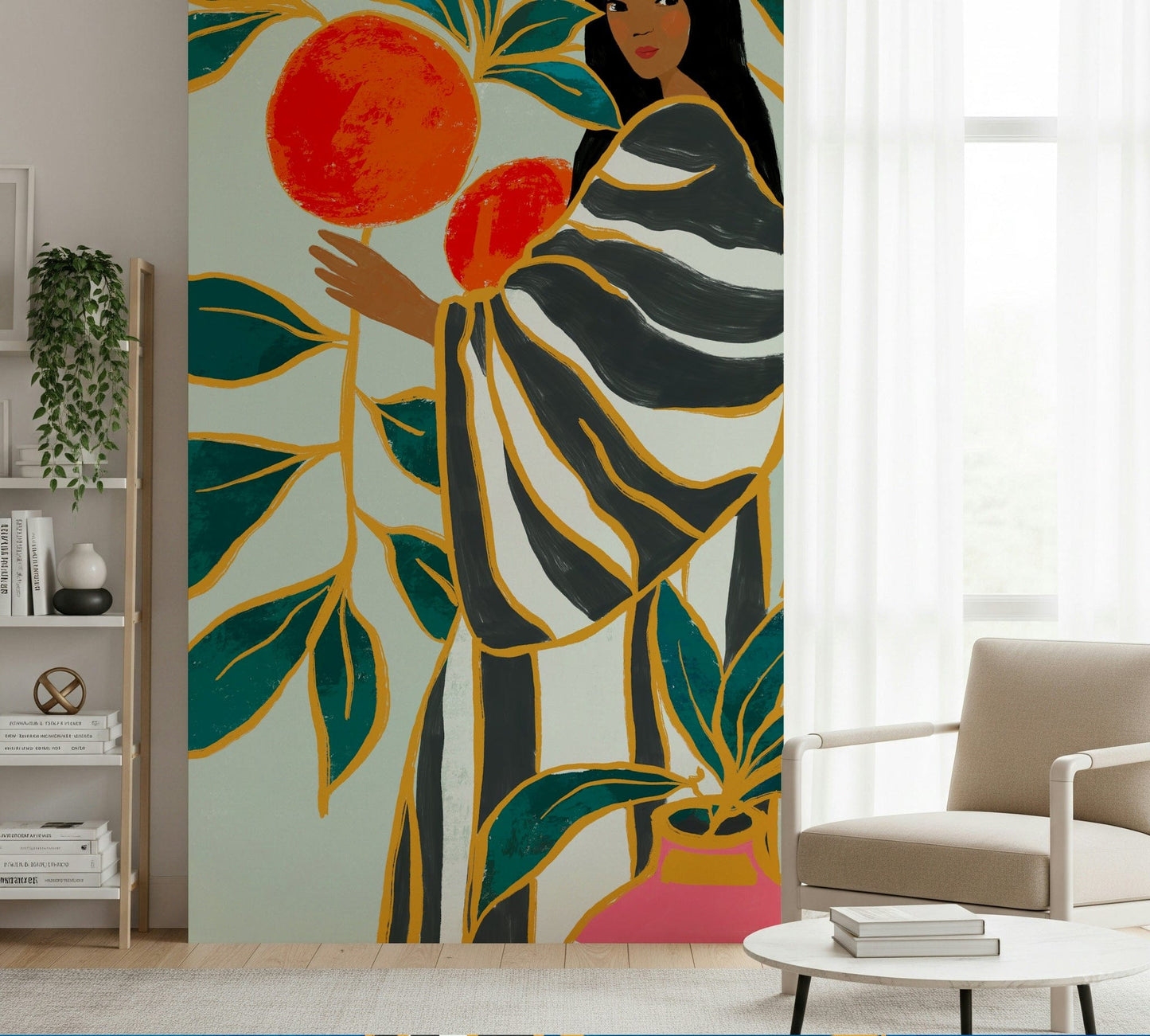 The Keeper of Oranges wallpaper mural with a folk-art woman and oranges beside a beige armchair and bookshelf