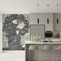 The Kiss II wallpaper mural of a monochrome couple behind a grey kitchen island with bar stools