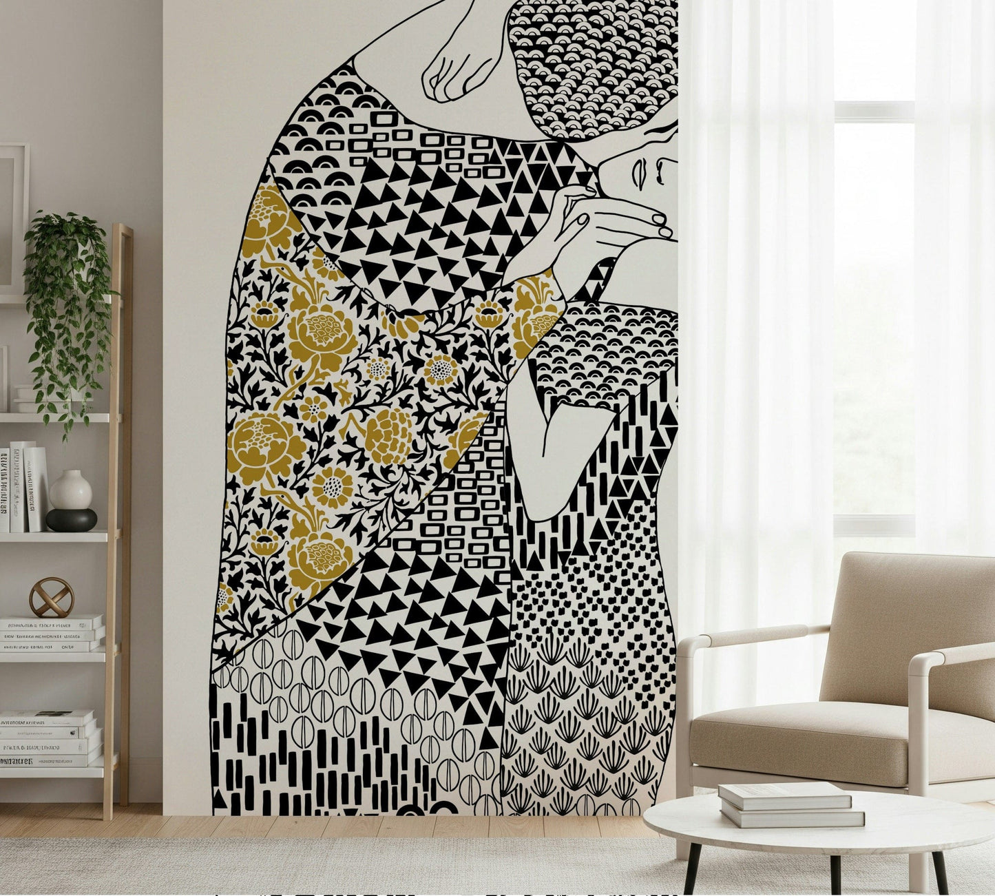 The Kiss wallpaper mural in black white and gold by white shelving and a beige armchair