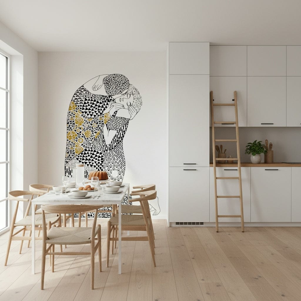 The Kiss wallpaper mural in black white and gold behind a marble dining table and wishbone chairs