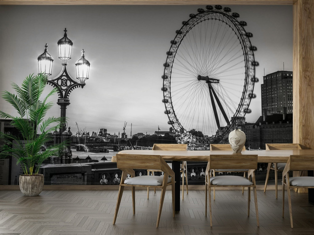 A wall mural with an artistic design of a lamp and a wheel.

