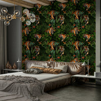 Vibrant tiger design surrounded by lush jungle foliage on wallpaper

