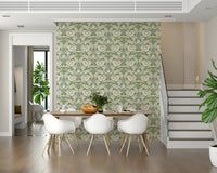 Timeless Garden Sage Green wallpaper of green floral damask in a dining nook with white chairs beside a staircase
