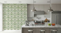 Timeless Garden Sage Green wallpaper of green and cream florals on an accent wall in a grey and wood kitchen