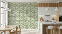 Timeless Garden Sage Green wallpaper of sage floral damask in a bright kitchen with a wood table and island