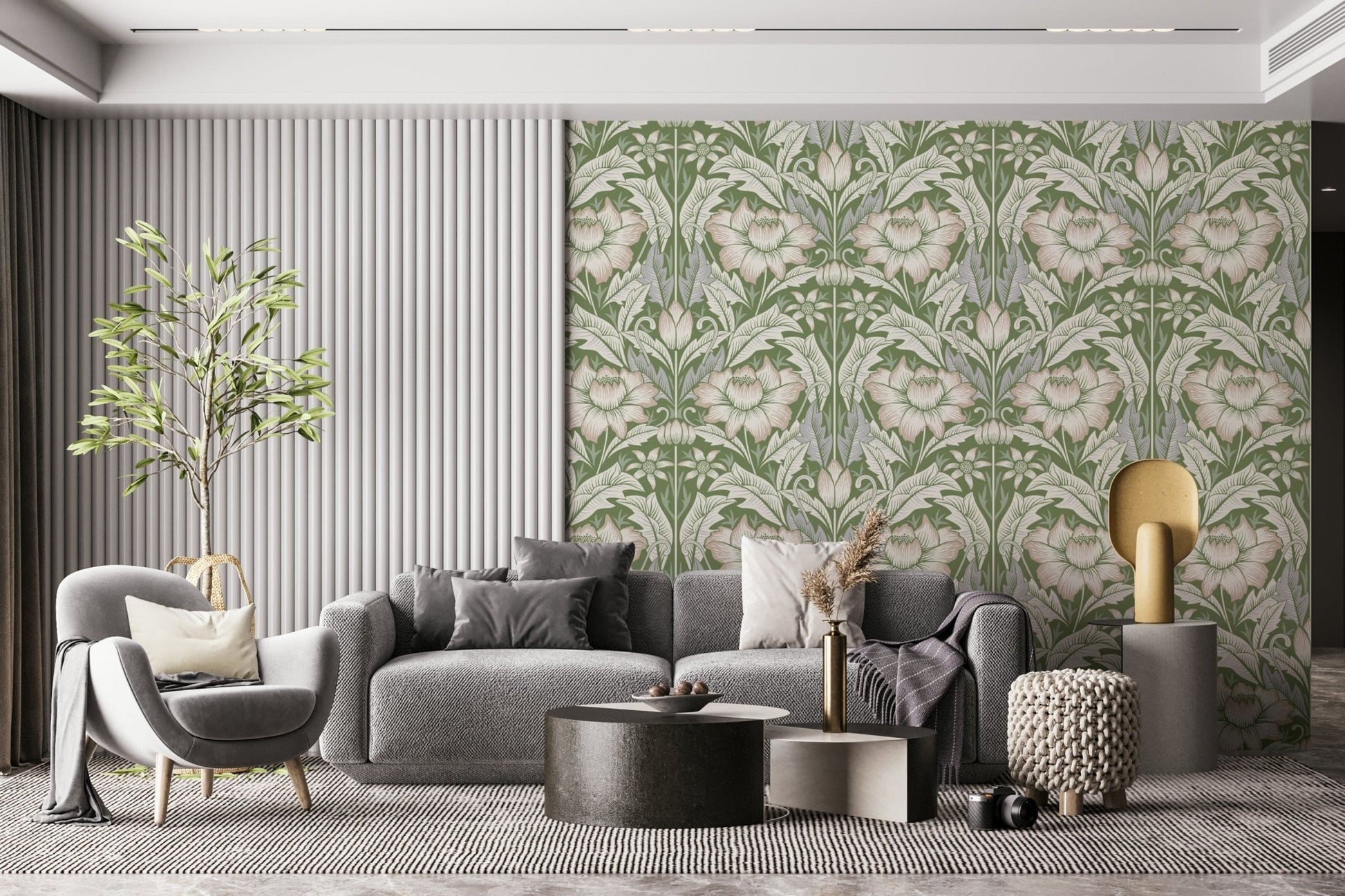 Timeless Garden Sage Green wallpaper with cream blooms on sage behind a grey sofa in a modern living room