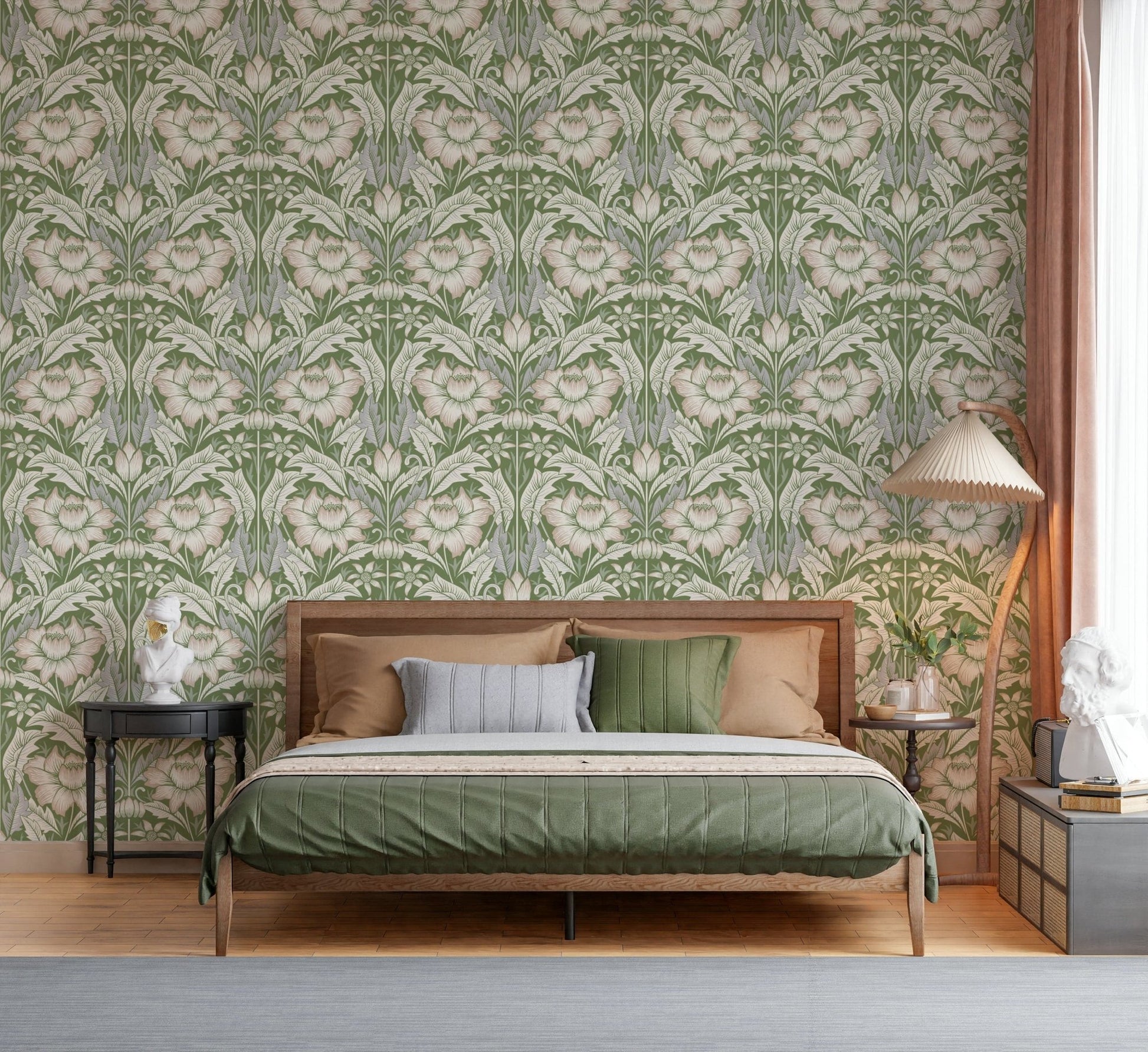 Timeless Garden Sage Green wallpaper of bold green florals behind a cane bed with green and tan bedding